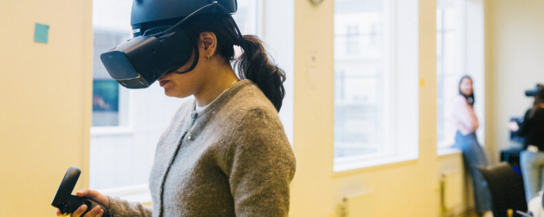 Students using VR during a medical simulation lab.